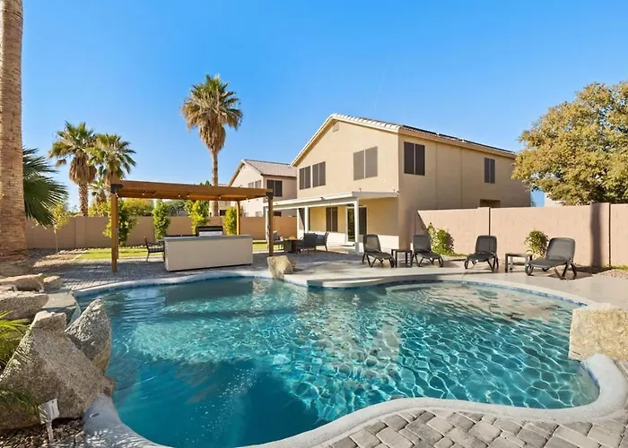 Sun-Drenched Terrace: Chic W Grille Firepit Pool